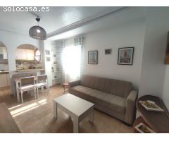 APARTAMENTO CON VISTAS DESPEJADAS Y PISCINA COMUNITARIA