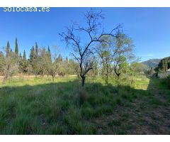 TERRENO RURAL FRENTE A URBANIZACIÓN