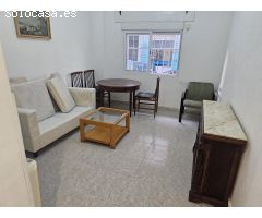 Vivienda en planta baja de 3 habitaciones,baño,salon y cocina.