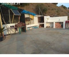 parcela de mangos con casa