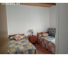 parcela de mangos con casa