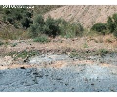 parcela en moclinejo con pozo de agua y vistas al mar