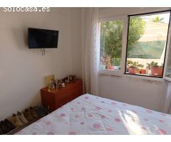 Adosado con piscina comunitaria, garaje y jardín en Calpe (Costa Blanca)