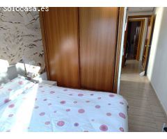 Adosado con piscina comunitaria, garaje y jardín en Calpe (Costa Blanca)