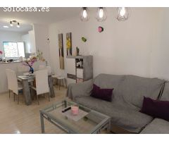 Adosado con piscina comunitaria, garaje y jardín en Calpe (Costa Blanca)