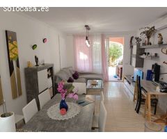 Adosado con piscina comunitaria, garaje y jardín en Calpe (Costa Blanca)