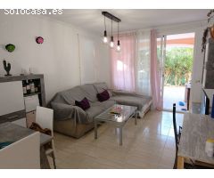 Adosado con piscina comunitaria, garaje y jardín en Calpe (Costa Blanca)