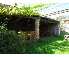 CASA DE PIEDRA CON ALMACEN Y TERRENO ZONA RARIS, TEO