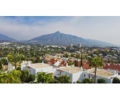Apartamento de dos dormitorios bellamente reformado en la comunidad cerrada de Jardines de Andalucía