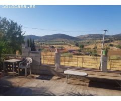 PARCELA RÚSTICA CON CASA A LA VENTA