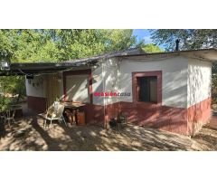PARCELA CON VIVIENDA Y PISCINA A LA VENTA