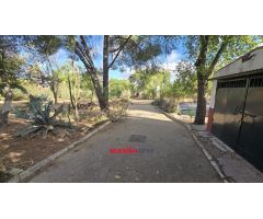 PARCELA CON VIVIENDA Y PISCINA A LA VENTA