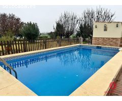PARCELA DE 1.650 METROS - CON AMPLIA CASA Y PISCINA - ZONA CORTIJO EL RUBIO