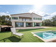 Finca rústica de cuatro habitaciones con piscina en Portol