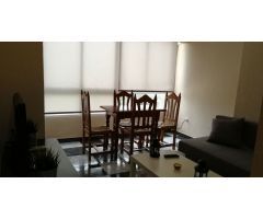 Apartamento de un dormitorio en urbanización con piscina, con agua y luz incluida en el precio.