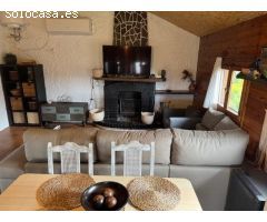 PRECIOSA CASA DE MADERA EN VENTA EN CAN CLARAMUNT CON GRAN PARCELA DE 1.000 M2