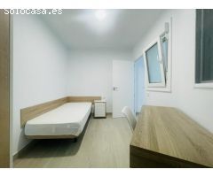Planta baja enfrente de la universidad con 4 habitaciones