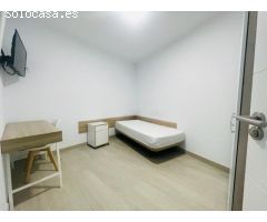 Planta baja enfrente de la universidad con 4 habitaciones