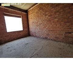 CASA CON NAVE EN CONSTRUCCIÓN