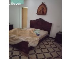 Casa y terreno anexo a la vivienda