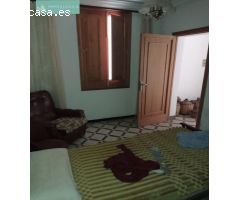 Casa y terreno anexo a la vivienda