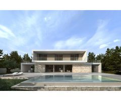 Bella villa de nueva construcción andando a la playa