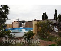 CASA CON AMPLIO TERRENO, PISCINA Y TRASTERO