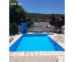 VENTA DE  PARCELA CON PISCINA Y CASA
