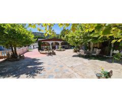 VENTA DE  PARCELA CON PISCINA Y CASA