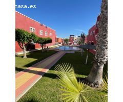 Estupendo apartamento en planta baja con jardin y piscina comunitaria