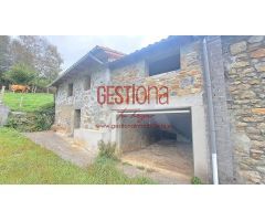 CABAÑA SEMIRREFORMADA EN BUSTABLADO. ARREDONDO