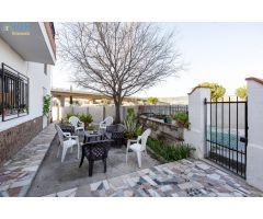 CASA CORTIJO CON PARCELA RÚSTICA DE RIEGO
