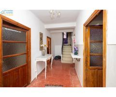 CASA CORTIJO CON PARCELA RÚSTICA DE RIEGO