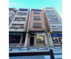 EDIFICIO CON TRES VIVIENDAS INDIVIDUALES