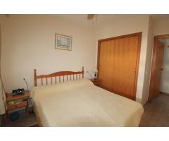 Apartamento de dos dormitorios en residencial privado con piscina
