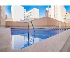 Apartamento con piscina, 2 hab. cocina independiente y garaje