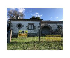 CASA DE PIEDRA EN PLANTA BAJA CON FINCA.