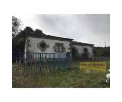 CASA DE PIEDRA EN PLANTA BAJA CON FINCA.