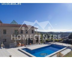 890.000 € (Antes 1.250.000 €) Casa con piscina y vistas a la montaña