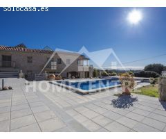 890.000 € (Antes 1.250.000 €) Casa con piscina y vistas a la montaña