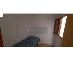 casa amplia , con 2 salidas a 2 calles y patio