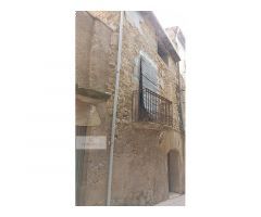 Casa de piedra en Batea