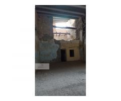 Casa de piedra en Batea