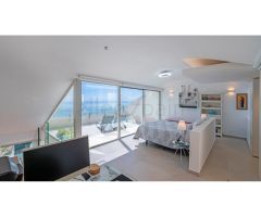 Atico duplex con impresionantes vistas panorámicas al mar, al templo budista y a