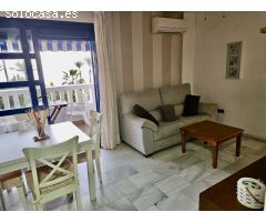Increíble piso en primera línea de playa con terraza y plaza de parking en El