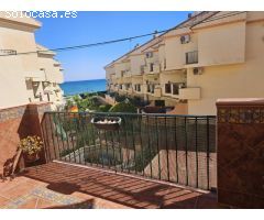 Encantador dúplex con terraza, vistas al mar y plaza de parking en Torre de