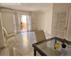 Encantador dúplex con terraza, vistas al mar y plaza de parking en Torre de