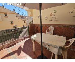 Encantador dúplex con terraza, vistas al mar y plaza de parking en Torre de