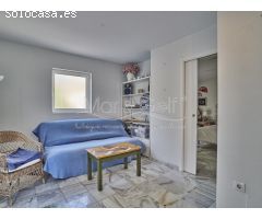 Exclusivo Ático en Venta con Espectaculares Vistas al Mar y al Castillo de Santa