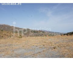 Parcela rústica con vistas a la montaña y ciudad
